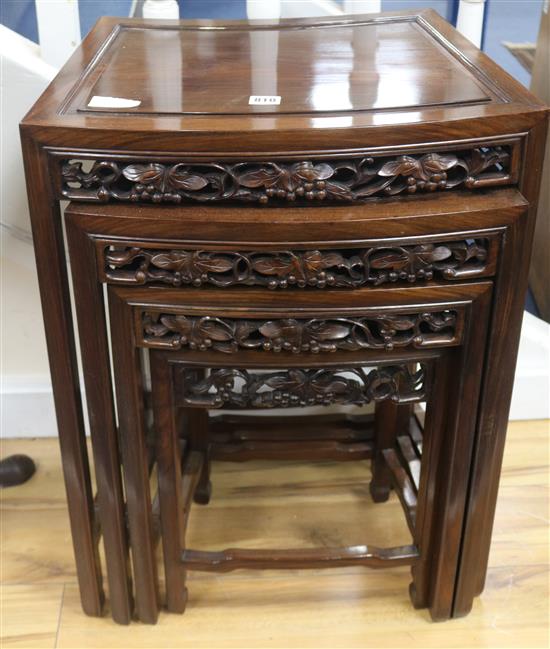 A nest of Chinese hardwood tables, H.70cm